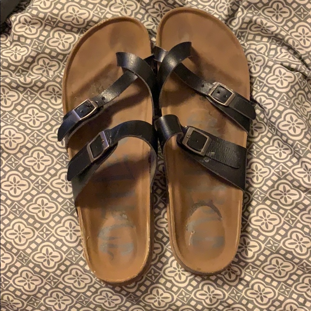 Black strappy flip flops